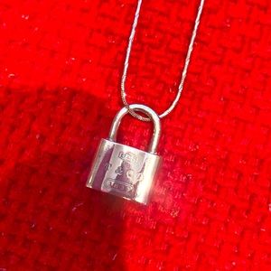 Tiffany& co padlock pendant necklace with chain.